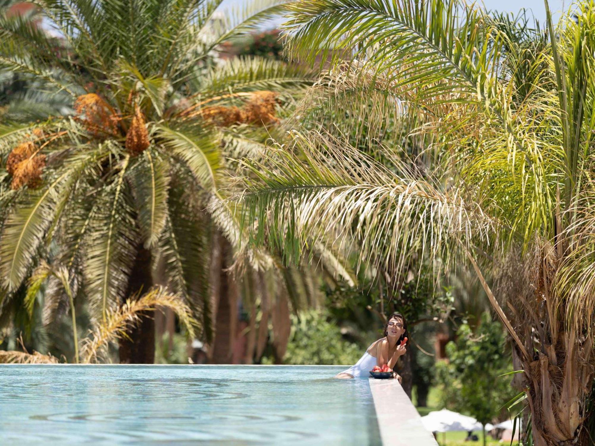 Sofitel Marrakech Palais Imperial & Spa Marrakesh Esterno foto The swimming pool at the hotel
