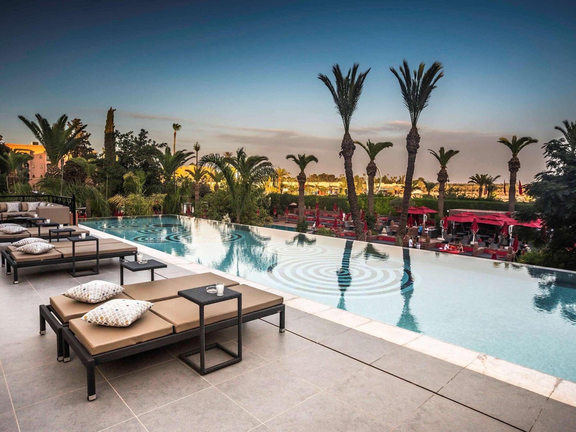 Sofitel Marrakech Palais Imperial & Spa Marrakesh Esterno foto The pool at the hotel