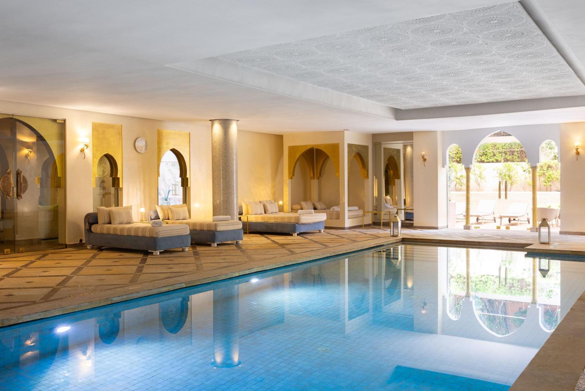Sofitel Marrakech Palais Imperial & Spa Marrakesh Esterno foto The swimming pool at the hotel